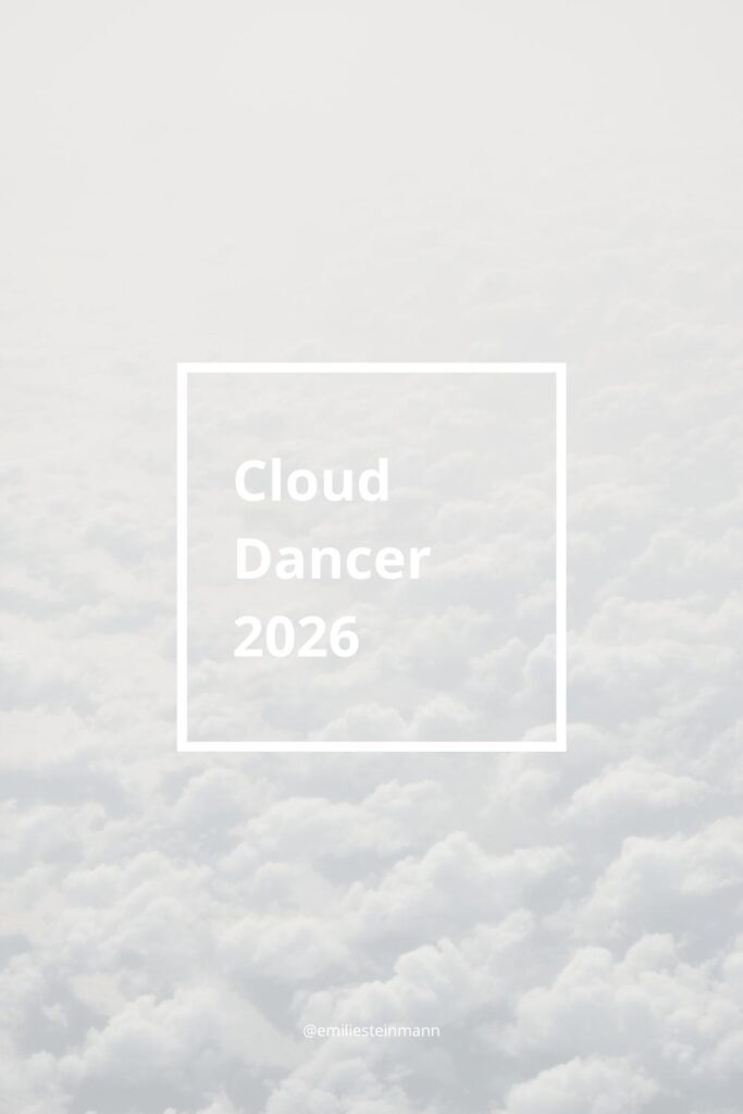 Pantone Color of the Year Cloud Dancer 2026 shown as a soft white and pale gray cloudscape background with minimalist framed typography.